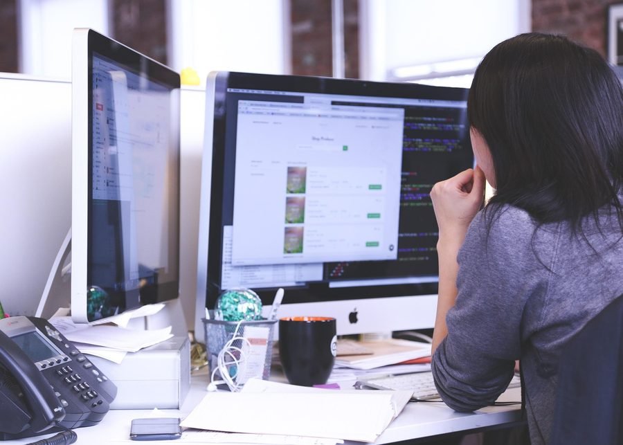 A BringOffer team member reviewing a client's profile and outreach plan